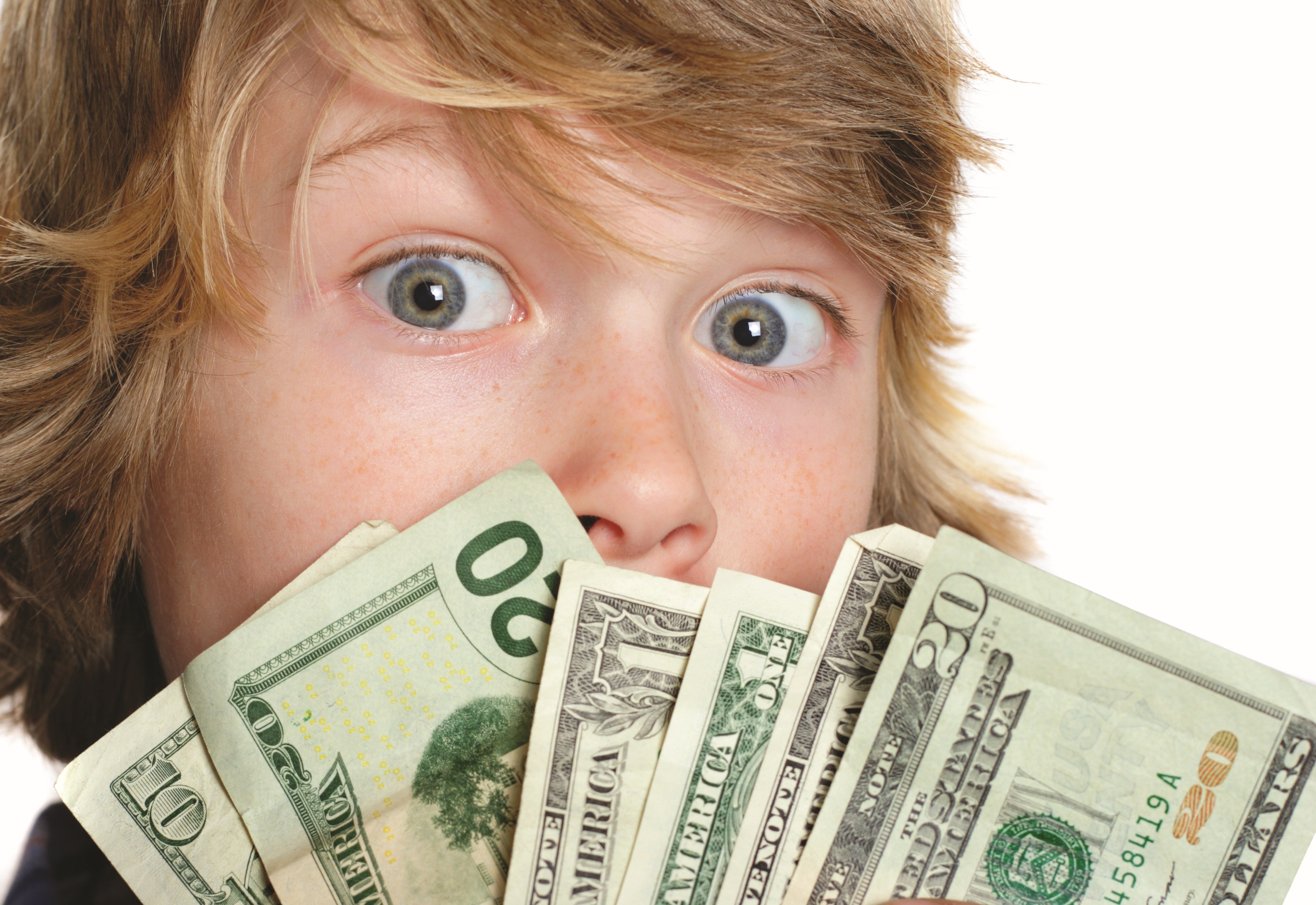 man smiling with cash in one hand, making thumbs-up gesture with the other
